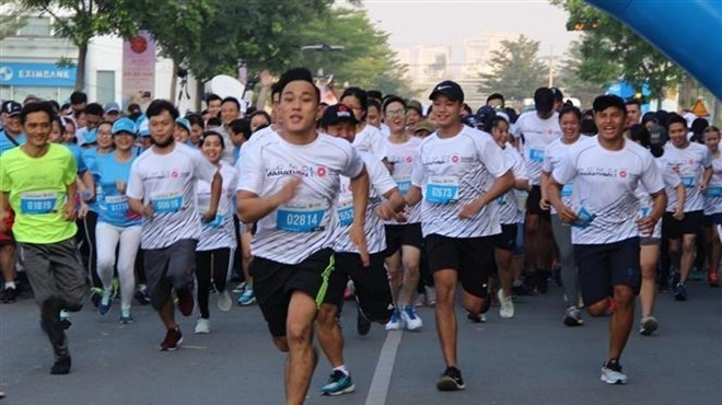 Runners compete at 5km event of the Ho Chi Minh City Marathon 2019 (Photo: VNA)