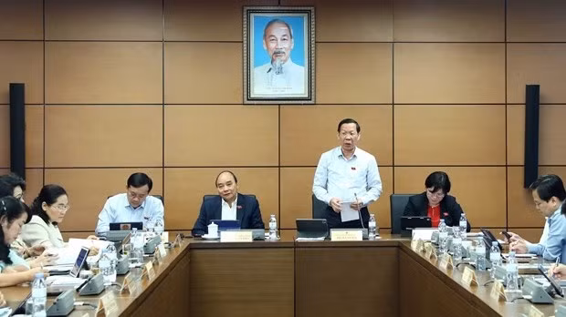 At a group discussion of the third session of the 15th National Assembly. (Photo: VNA)