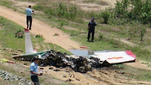 Part of the crashed aircraft (Photo: VNA)