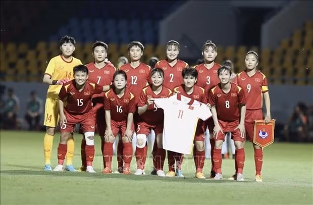 The Vietnamese female football players (Photo: VNA)