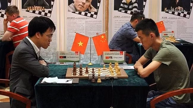 This is the first time after nearly six years that Quang Liem (left) has made a breakthrough in terms of his FIDE world rating.