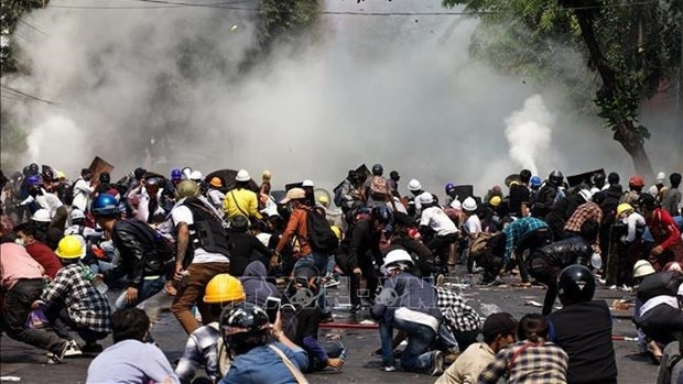 A protest in Yangon, Myanmar, on March 3, 2021. (Photo: AFP/VNA)