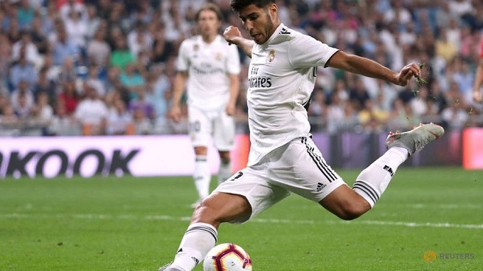 Real Madrid's Marco Asensio scores their first goal. (Reuters)