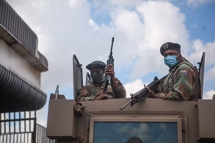 Members of the South African National Defence Force (SANDF) patrol the streets of Alexandra. (Photo: Gallo Images)