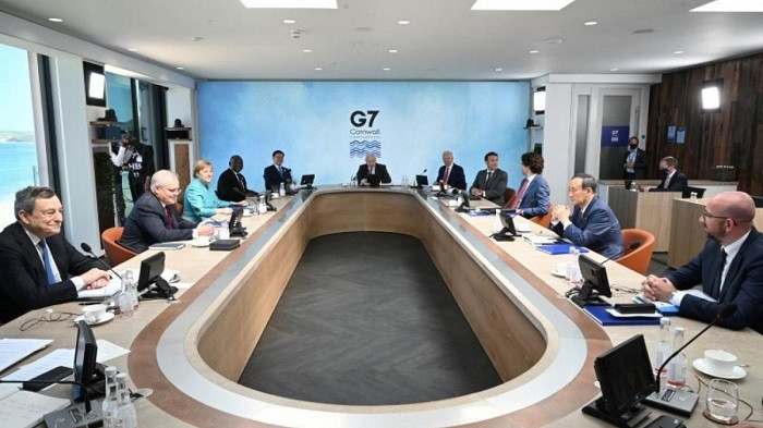 G7 leaders commit to increasing climate finance contributions.