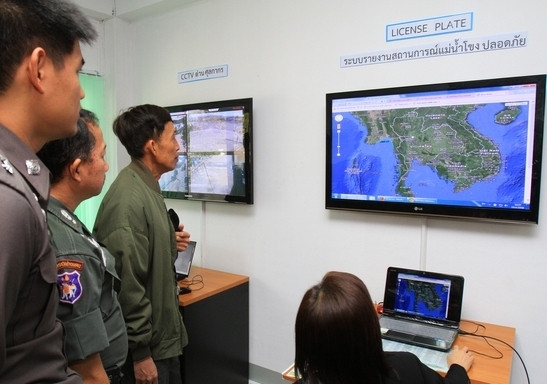 A Narcotics Control Board officer demonstrates how information on the Mekong River is tracked after the opening of the Safe Mekong Coordination Centre in Chiang Mai on January 15. (Credit: chiangraitimes.com)