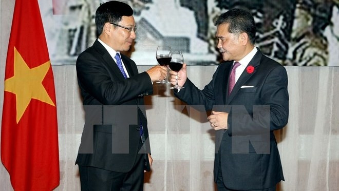 Deputy PM and Foreign Minister Pham Binh Minh and Malaysian Ambassador Dato Azmil Bin Mohamed Zabidi 