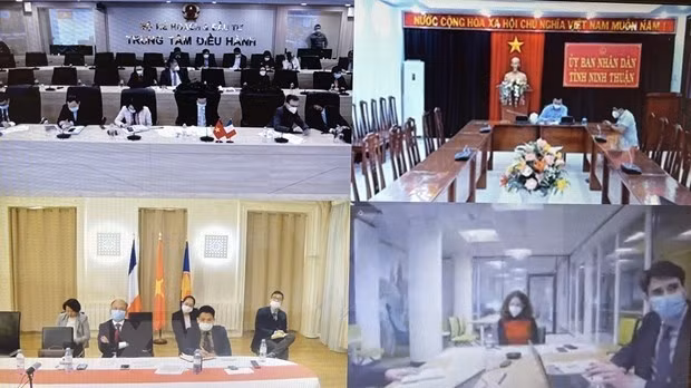 The seventh high-level economic dialogue between Vietnam and France takes place in the form of videoconference on January 20. (Photo: VNA)