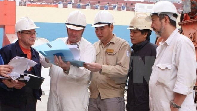 Foreign experts working on aid projects for foreign NGOs and Vietnamese nationals employed by UN organisations in Vietnam will be exempted from personal income tax. (Credit: VNA)