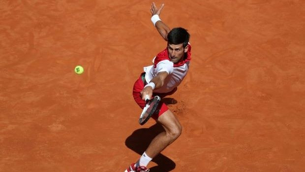 Serbia's Novak Djokovic in action during his first round match against Japan's Kei Nishikori. (Photo: Reuters)