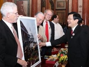 President Truong Tan Sang and international delegates attending the 40th anniversary of the signing of the Paris Agreeme