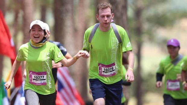 Runners at the race in 2019 (Photo: VNA)