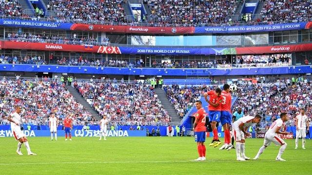 Serbia's Aleksandar Kolarov scores their first goal from a free kick. (Photo: Reuters)
