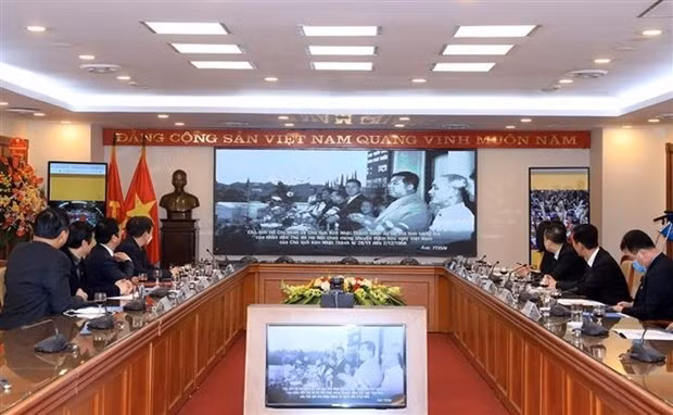 Exhibited photos screened at the launch ceremony (Photo: VNA)