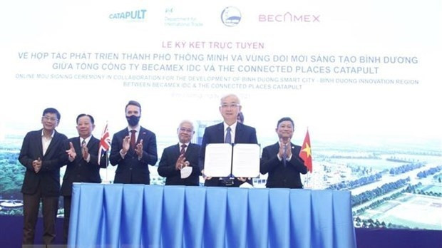 At the signing ceremony (Photo: VNA)