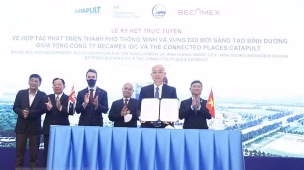 At the signing ceremony (Photo: VNA)