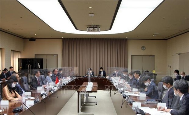 Participants at the meeting (Photo: VNA)