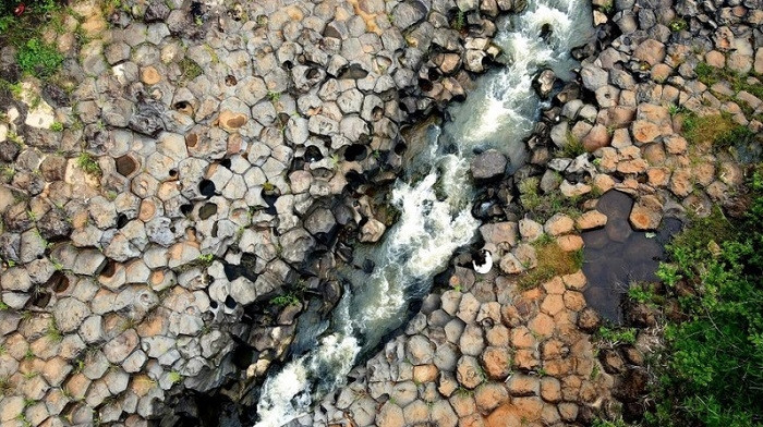 Seen from above, the ancient rocky outcrop looks like a giant honeycomb. (Photo: Wanderlust) 