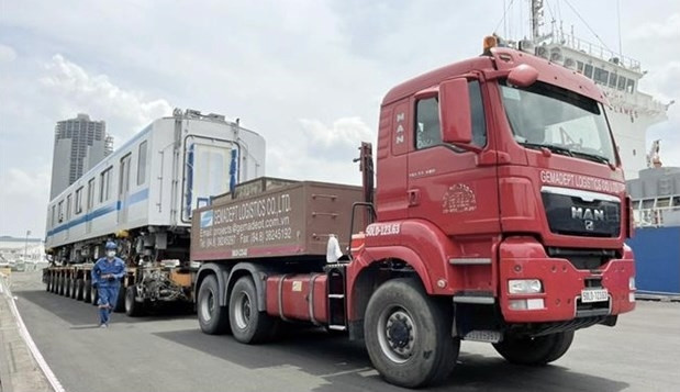 The sixth and seventh trains for Ho Chi Minh City’s Metro Line No.1 (Ben Thanh-Suoi Tien) arrive in Khanh Hoi port of the city on July 13 (Photo: VNA)