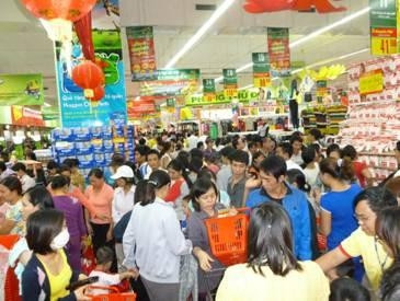 People shopping in Big C supermarket at Savico Megamall
