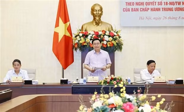 NA Chairman Vuong Dinh Hue speaks at the event. (Photo: VNA)