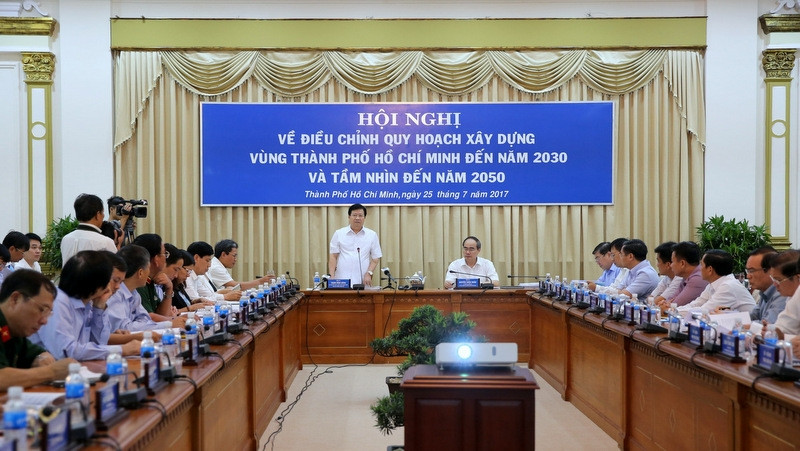 Politburo member and Secretary of Ho Chi Minh City's Party Committee Nguyen Thien Nhan and Deputy PM Trinh Dinh Dung co-chairs the conference. (Credit: VGP)