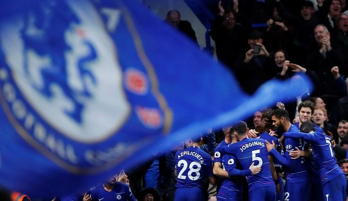 Soccer Football - Premier League - Chelsea v Manchester City - Stamford Bridge, London, UK - December 8, 2018 Chelsea's David Luiz celebrates scoring their second goal with team mates. (Reuters)