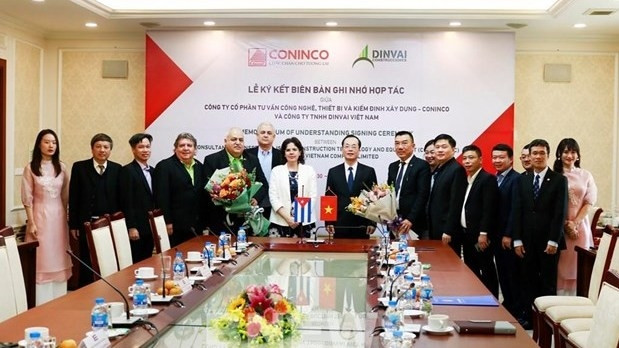 At the signing ceremony (Photo: VNA)