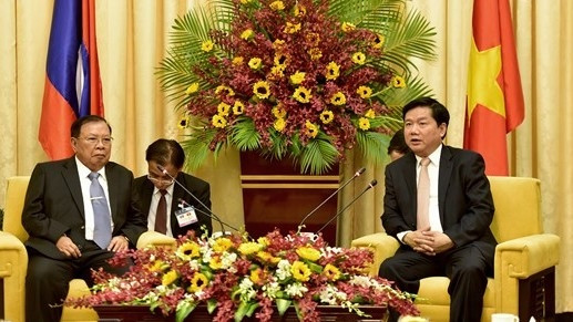 HCMC Secretary Dinh La Thang and Lao Party General Secretary and President Bounnhang Volachith