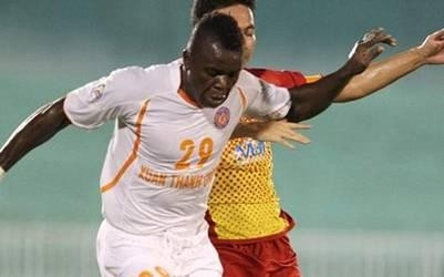Nigerian striker Emeka Oguwike (in white) scores twice to give Saigon Xuan Thanh a full three points