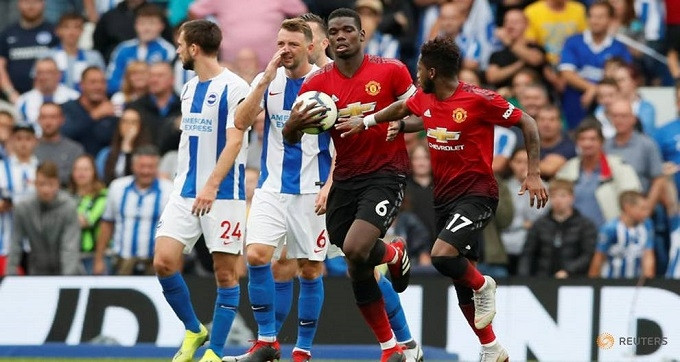Manchester United's Paul Pogba celebrates scoring their second goal with Fred. (Reuters)