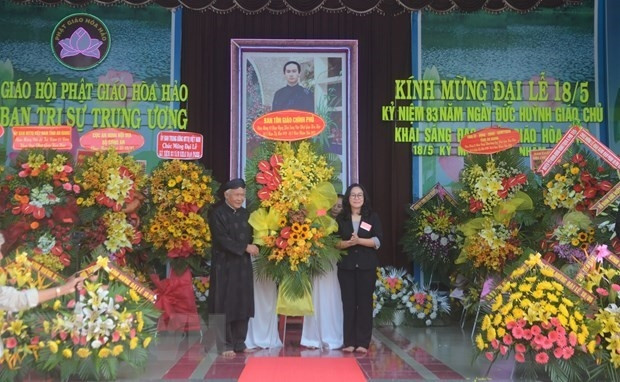 At the ceremony to mark the 83rd founding anniversary of Hoa Hao Buddhism. (Photo: VNA) 