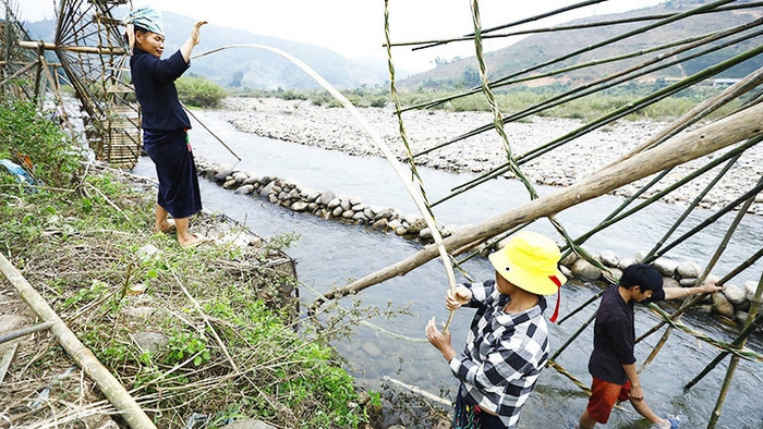 In early December, local people construct new waterwheels.