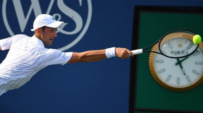 Aug 25, 2020; Flushing Meadows, New York, USA; Novak Djokovic hits the ball against Tennys Sandgren during the Western & Southern Open at the USTA Billie Jean King National Tennis Center. (Photo: USA TODAY Sports)