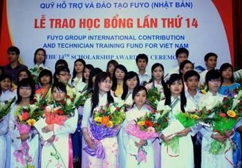 Outstanding students receiving scholarships at the ceremony