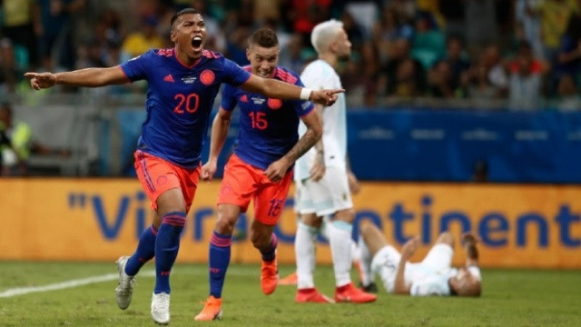 Roger Martinez (No. 20) celebrates his goal as Colombia beat Argentina 2-0 in their Copa America Group B opener at the Fonte Nova Arena in Salvador on Saturday. (Photo: Copa America)