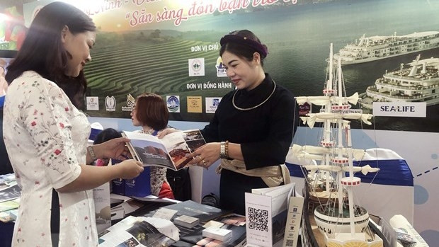 At the programme (Photo: VNA)