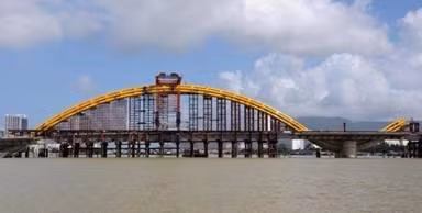 The steel arch of the Dragon Bridge's main span