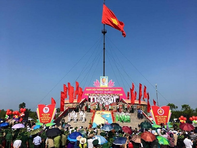 At the flag-raising ceremony