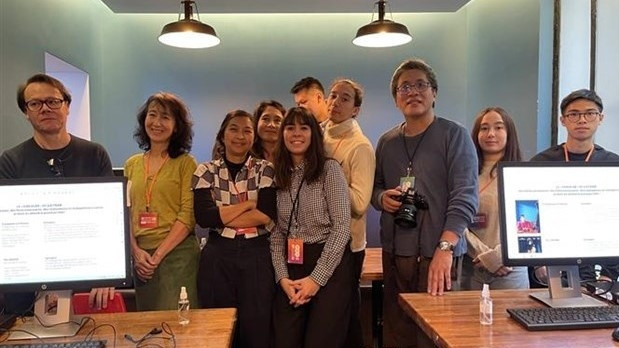 The organising board and young OV directors at the event. (Photo: VNA)