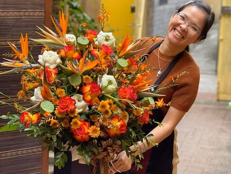 Bui Bang Giang and basket flower arrangement made by Comida Ngon (Photo credit: Bui Bang Giang)