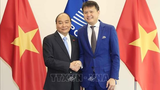 President Nguyen Xuan Phuc (L) and with WIPO Director General Daren Tang (Photo: VNA)