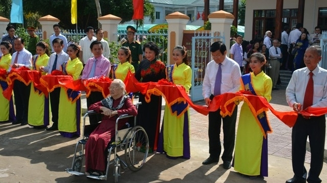The ribbon-cutting ceremony for the memorial house for Comrade Ngo Thi Hue 