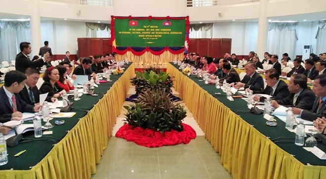 At the meeting (Photo: VNA)