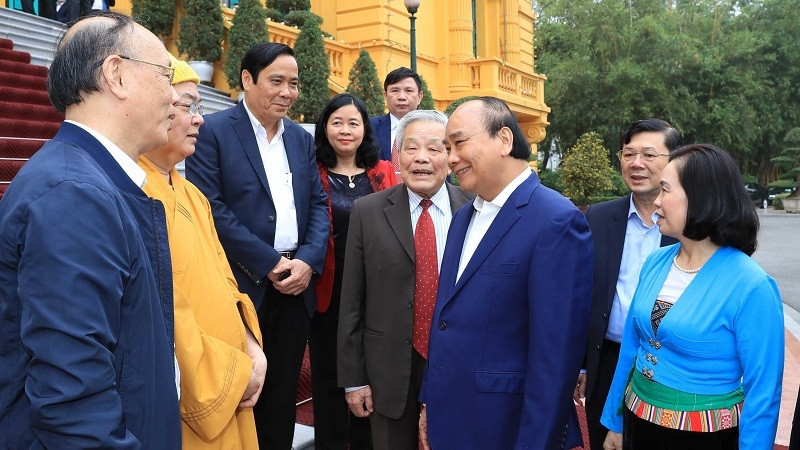 President Nguyen Xuan Phuc and delegates attending the conference (Photo: VNA)