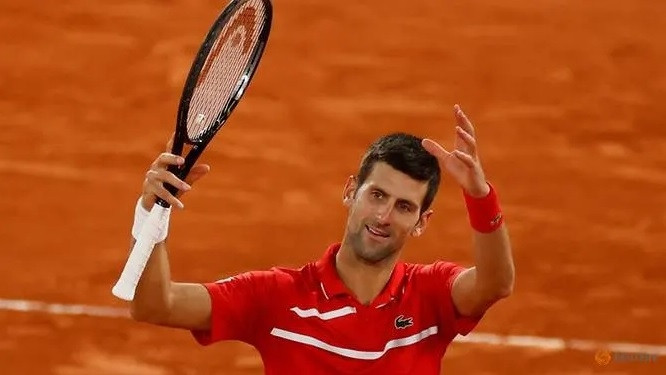 Tennis - French Open - Roland Garros, Paris, France - October 9, 2020 Serbia's Novak Djokovic celebrates after winning his semi final match against Greece's Stefanos Tsitsipas. (Reuters)