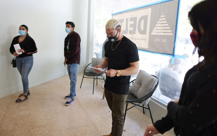 Workers attend a job fair in Long Beach, California, US in May 2021. (Photo: Reuters/Lucy Nicholson)