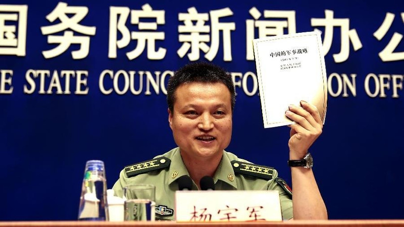Chinese Defense Ministry spokesperson Yang Yujun introduces the white paper about China's military strategy at a press conference in Beijing on May 26 (Photo: Xinhua)