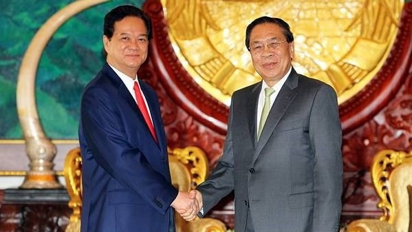 Prime Minister Nguyen Tan Dung and General Secretary of the Lao People’s Revolutionary Party and President Choummaly Sayasone. (Credit: VNA)