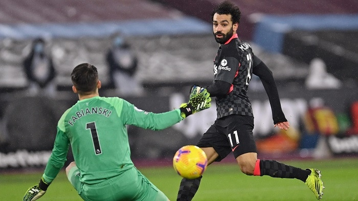 Soccer Football - Premier League - West Ham United v Liverpool - London Stadium, London, Britain - January 31, 2021 Liverpool's Mohamed Salah scores their second goal. (Photo: Pool via Reuters)